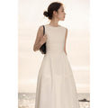 Vestido branco de decote redondo, de decote redondo e sem mangas para mulher, novo verão de 2026, saia comprida elegante e fina com bainha larga